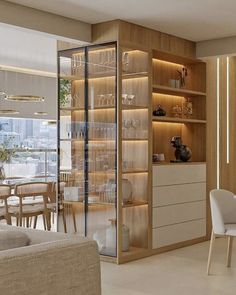 a living room filled with furniture next to a tall glass wall cabinet in front of a window