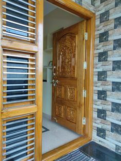 a wooden door is seen through a mirror