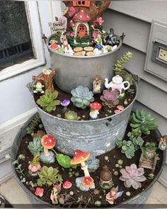 a metal bucket filled with lots of different types of plants and mushrooms on top of each other