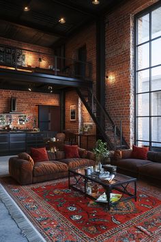 a living room filled with furniture and a fire place next to a brick wall covered in windows