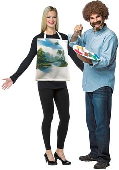 a man and woman are dressed up as artist with an easel on their shoulder