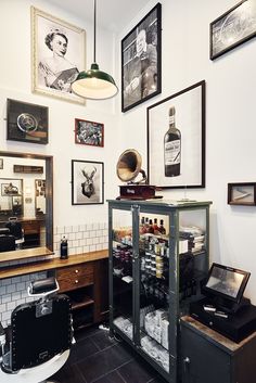 a barber shop with pictures on the wall