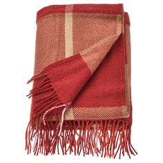 a red and beige plaid blanket with fringes