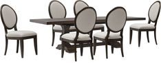 a dining room table and six chairs with white upholstered backrests on each side