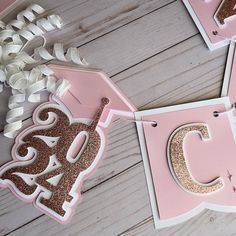 pink and gold birthday banner with glitter letters