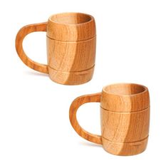 two wooden mugs sitting next to each other