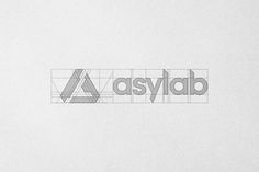 the logo for asylab is shown in grey and white