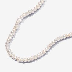 Introducing a new kind of classic with the Treated Freshwater Cultured Pearls T-bar Collier Necklace. This necklace features a row of tiny, elongated treated freshwater cultured pearls that close with an organically-shaped 14k gold-plated T-bar closure. Each treated freshwater cultured pearl is unique and can vary in size and colour; normal wear and tear may occur with this material. Our freshwater cultured pearls are treated with bleaching and lustre enhancement. - Pandora Treated Freshwater Cultured Pearls T-bar Collier Necklace - 14k Gold-plated unique metal blend / Treated freshwater cultured pearl / White - Sz. 17.7 in Pandora Essence, Custom Charm Bracelet, Pearl Charm Necklace, Rose Gold Plated Ring, Solid Gold Necklace, Solid Gold Earrings, White Gold Necklaces, Ring Pendant Necklace, White Gold Earrings