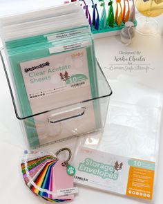 clear acrylic sheets, binders, and other office supplies on a table