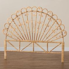 a bamboo headboard made to look like a fan