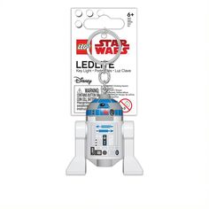 a star wars r2d2 keychain is in the packaging