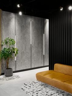 Industrial Interior Design Reception, Concrete Commercial Interiors, Modern Office Entry Design, Apartment Lobby Design Modern, Moody Commercial Design, Industrial Lobby Design Offices, Concrete Wall Design Interior, Concrete Wall Ideas Interior, Dark Lobby Design