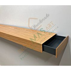 a wooden shelf with two drawers on it