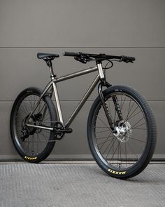 a bike parked in front of a garage door