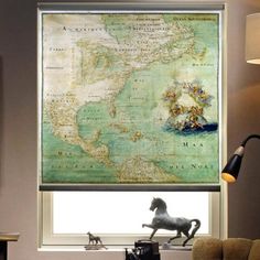 a living room with a large map on the wall and a horse figurine