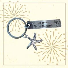 a keychain with a starfish on it that says life is better at the beach