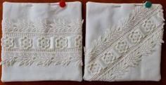 two white embroidered napkins on a wooden table