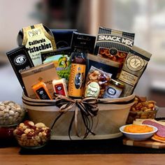 a basket filled with snacks and crackers on top of a table