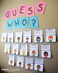 the word guess who? is displayed on a bulletin board