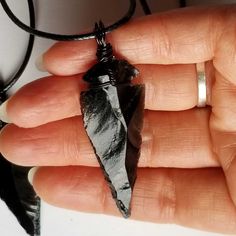 Black Obsidian Arrowhead protection necklace for men, women, unisex. ♥ See more of my arrowhead necklaces here: https://www.etsy.com/shop/UrbanMoonJewelry?search_query=arrow To see more sizes & larger sizes, check my inventory in my new store here.  https://www.etsy.com/shop/TerraWildCraft?search_query=obsidian 2.5 inch Obsidian Arrowhead Necklace: https://www.etsy.com/listing/1604295319/25-inch-black-obsidian-arrowhead 2.75 inch Obsidian Arrowhead Necklace: https://www.etsy.com/listing/15913223 Handmade Black Arrowhead Necklace, Handmade Black Arrowhead Jewelry, Arrow Pointing Down, Obsidian Arrowhead, Arrow Head, Arrowhead Necklace, Pendant For Men, Wire Wrap Pendant, Wire Wrapping Stones