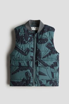 Padded vest in quilted woven fabric. Ribbed stand-up collar  zipper at front with anti-chafe chin guard  and front pockets with flap and hook-loop fastening. Lined. Puffer Vest For Boys, Toddler Quilted Vest, Toddler Green Vest, Green Padded Gilet, Puffer Gilet, Military Cotton Vest For Outdoor, Outdoor Jackets, Padded Vest, Sweater Blazer