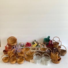 several baskets and shoes are sitting on the floor