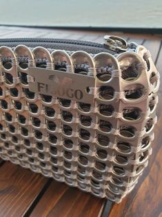 a purse sitting on top of a wooden table