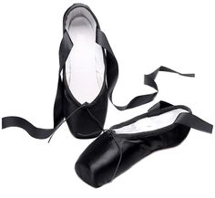 a pair of black ballet shoes tied together