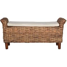 a wicker bench with a cushion on it