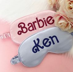 Personalised Barbie Sleep Eye Masks Have the most restful sleep with our personalised eye masks. Their silky satin material is perfect for ideal sleep without irritation. Fitting most faces, the masks have an adjustable elasticated band that won't interfere with sleep.  They are the perfect gift for brides, bridesmaids, mothers, daughters, friends and the list goes on! Personalisation: 1. Name (max 12 characters, no special characters) 2. Font Choice (Styles can be seen in images) Material: Satin Silk Dimensions: Width of mask: 20 cm Note: Shedding of glitter is normal with glitter fonts. If no font is requested, we will pick a font choice for you. IMPORTANT We aim to personalise and dispatch your order within 48 hrs. As in line with UK Law, refunds/returns/exchanges are NOT permitted on a Barbie Font, Satin Eye Mask, Sleep Eye, Barbie Bride, Sleep Masks, Eye Masks, Couples Gift, Mask Shop, Barbie And Ken