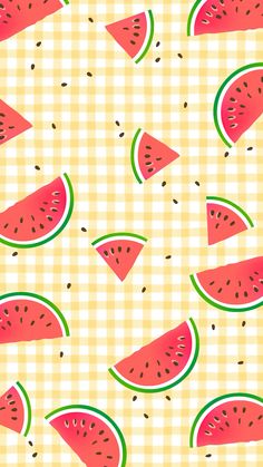 watermelon slices on a checkered tablecloth