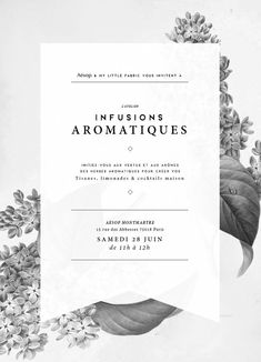 an elegant wedding card with flowers and leaves in black and white on a gray background