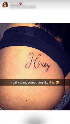 a woman's stomach with the words honey tattooed on her belly and an emoticive message above it