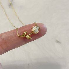 "Opal Tulip Necklace Chain: 15\" 18k Gold dipped over brass Color: Gold, Silver and Rosegold Pendant: 20mm Ready for a Gift 🎁" خواتم خطوبة, Tulip Necklace, Jewelry Accessories Ideas, Dope Jewelry, Classy Jewelry, Charm Necklaces, Bronze Gold, Fancy Jewellery, Funky Jewelry