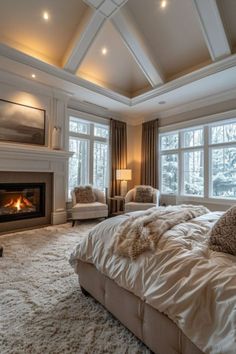 a large bedroom with a fireplace in the corner