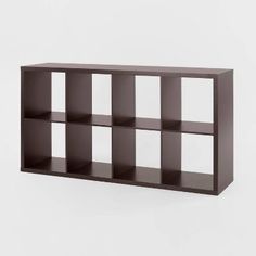 an empty shelf with several cubes in it on a white background, there is no image here to provide a caption for