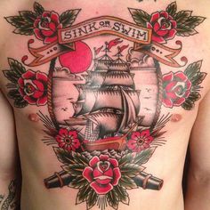 a man's chest with a ship and roses on it