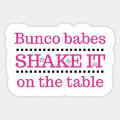 a sign that says, bunco babes shake it on the table with pink lettering