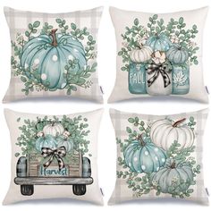 four pillows with pumpkins and leaves on them, one has a bow in the center