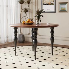 a dining room table with fruit on it