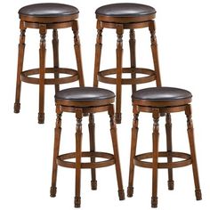 four wooden stools with black leather seats