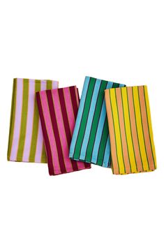 four different colored striped napkins sitting on top of each other