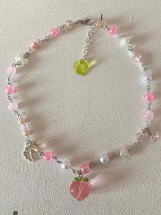 If you like peaches and you like pink, this necklace is perfect for you!  This is an resizable necklace, with a super cute pink peach charm on it. Pink Jellyfish, Peach Necklace, Bracelet Inspo, Red Tulips, Charm Necklaces, Pink Peach, Wire Bracelet, Crafty Diy, Pink Bow