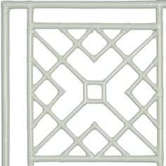 a white decorative wall panel with an intricate design