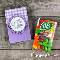 two candy bags and a card that says just for you