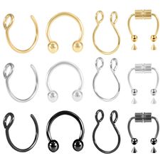 various types of nose rings and piercings on white background with clipping area for text