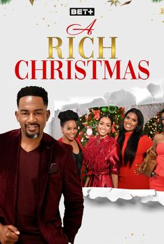 a man in a red suit standing next to a christmas card with the words rich christmas on it