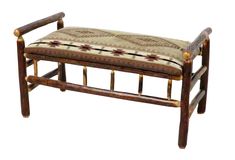 a wooden bench with an upholstered seat cushion