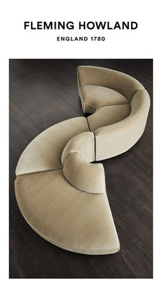 an image of a curved couch on the floor