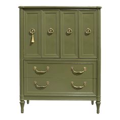 a green cabinet with brass handles and knobs on the front, against a white background